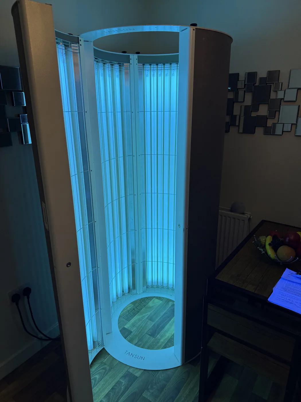 Sapphire Sunshower lit with the door open, standing in a customer's room